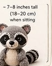 Finished raccoon amigurumi next to a ruler showing its seated height of about 7-8 inches